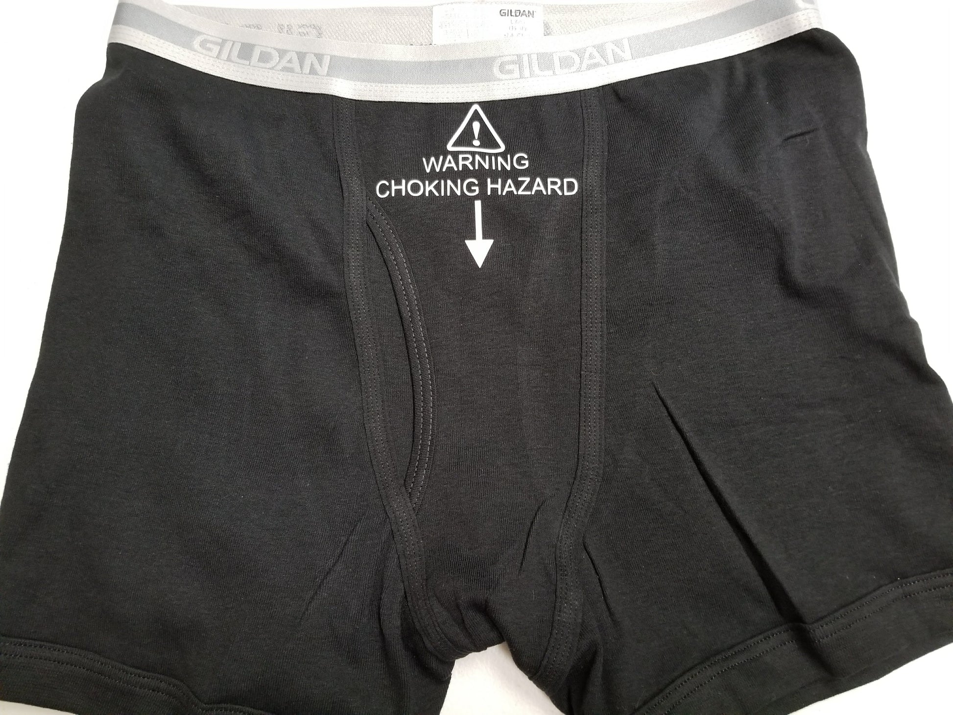 Underwear with “WARNING: CHOKING HAZARD” label in black boxer briefs
Funny gag gift underwear – choking hazard symbol design
Black and grey men’s boxers and briefs with warning print