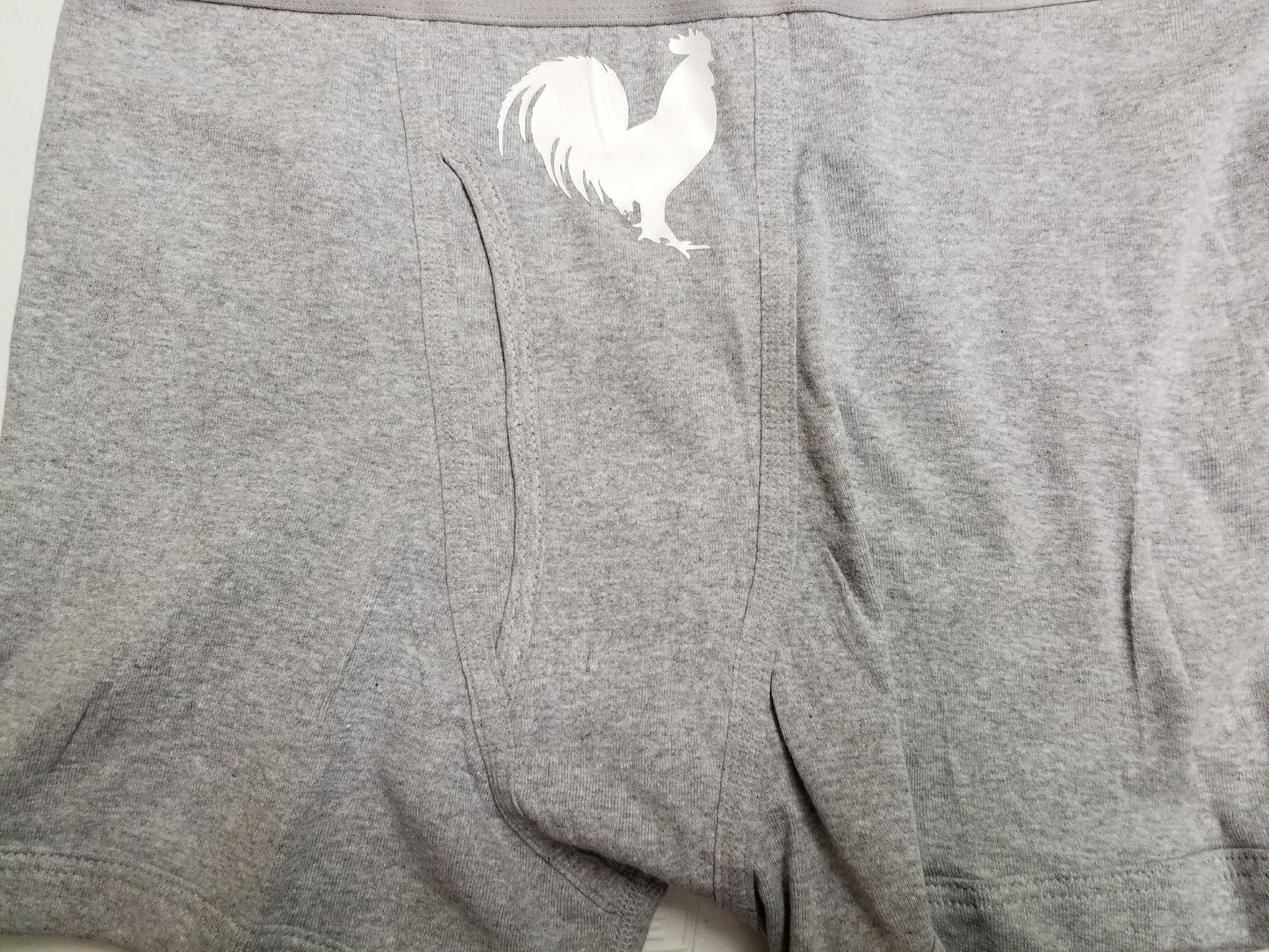 Funny rooster underwear in black boxer briefs – cock design
Men’s underwear with rooster graphic – cocky gift idea
Boxer, brief, and boxer brief styles in black or grey with rooster print