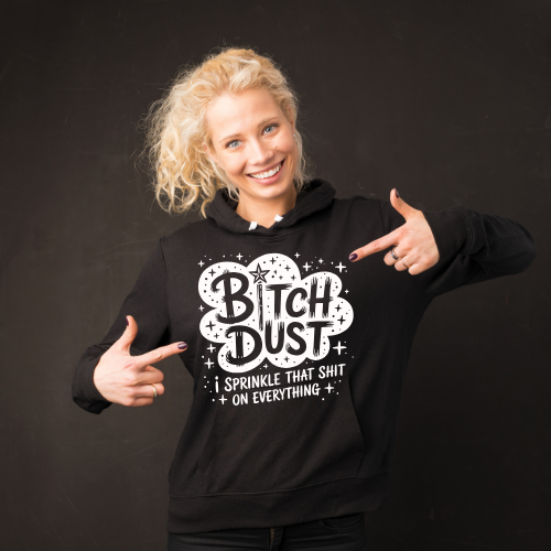 Person wearing a black hoodie with text design, pointing to the text on a dark background