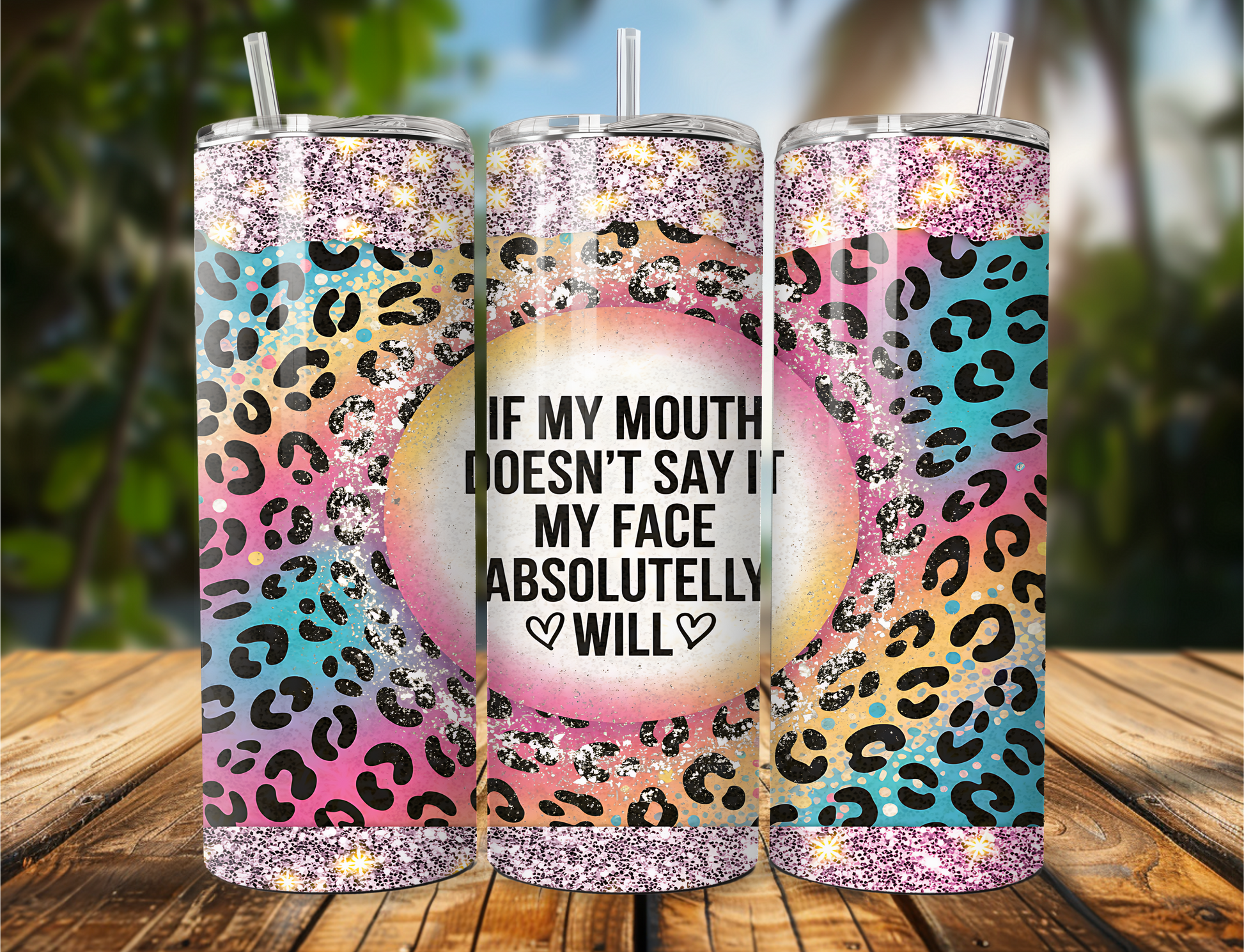 20 oz stainless steel tumbler with quote ‘If My Mouth Doesn’t Say It, My Face Absolutely Will’ on cheetah print and glitter background.