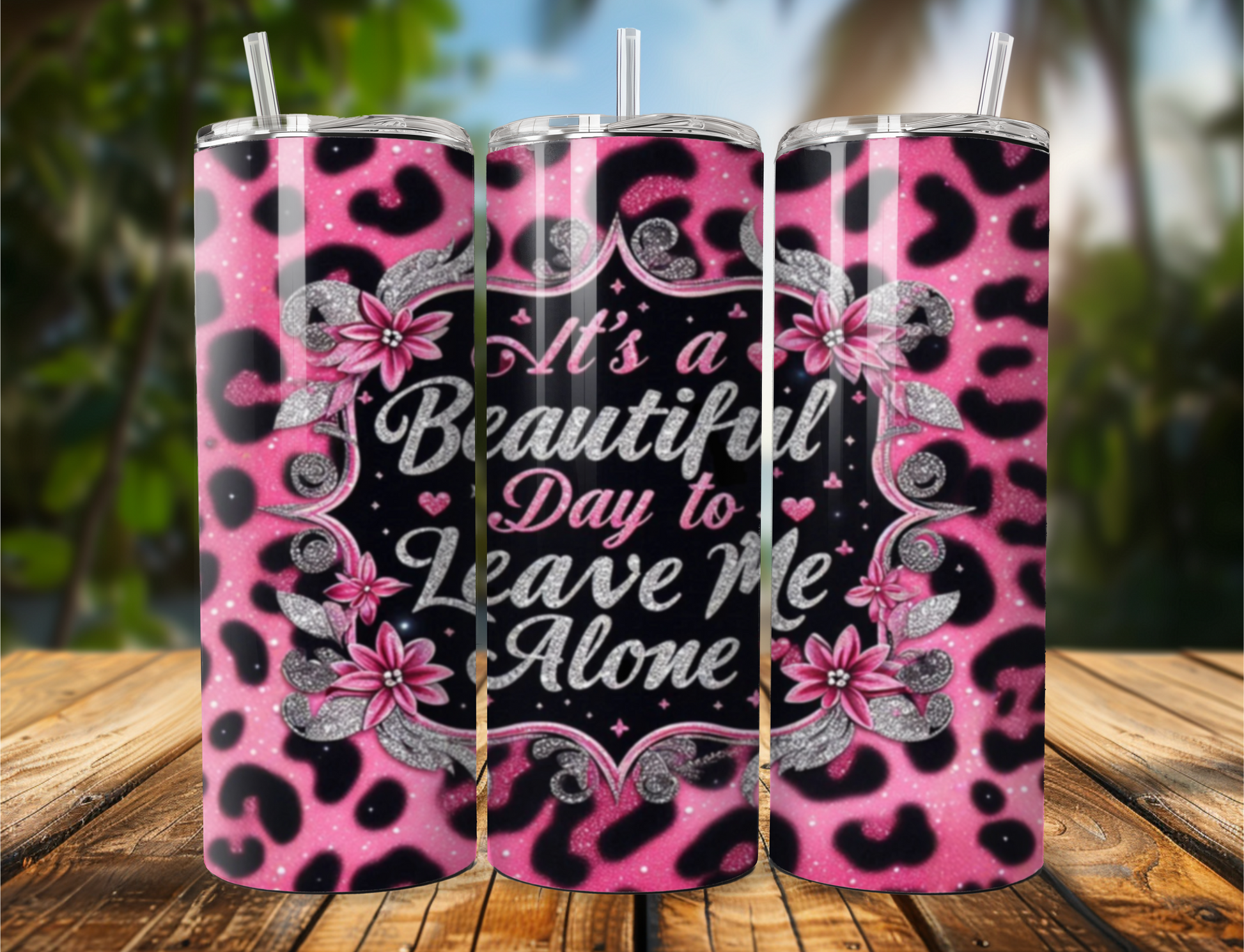 "Snarky pink and black cheetah print tumbler with the phrase 'It's a Beautiful Day to Leave Me Alone' in bold lettering. Available in 20oz or 30oz sizes. Stainless steel with a glossy finish."