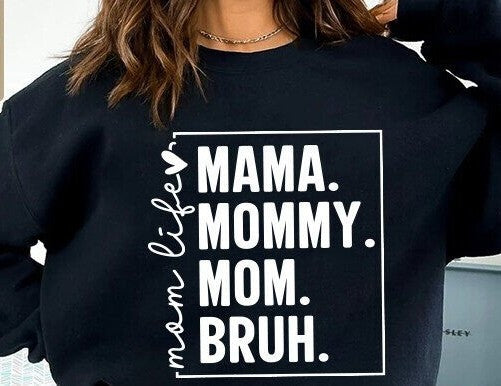 Crewneck sweatshirt that says “MAMA. MOMMY. MOM. BRUH.” in colorful bold lettering, perfect for moms with a sense of humor.