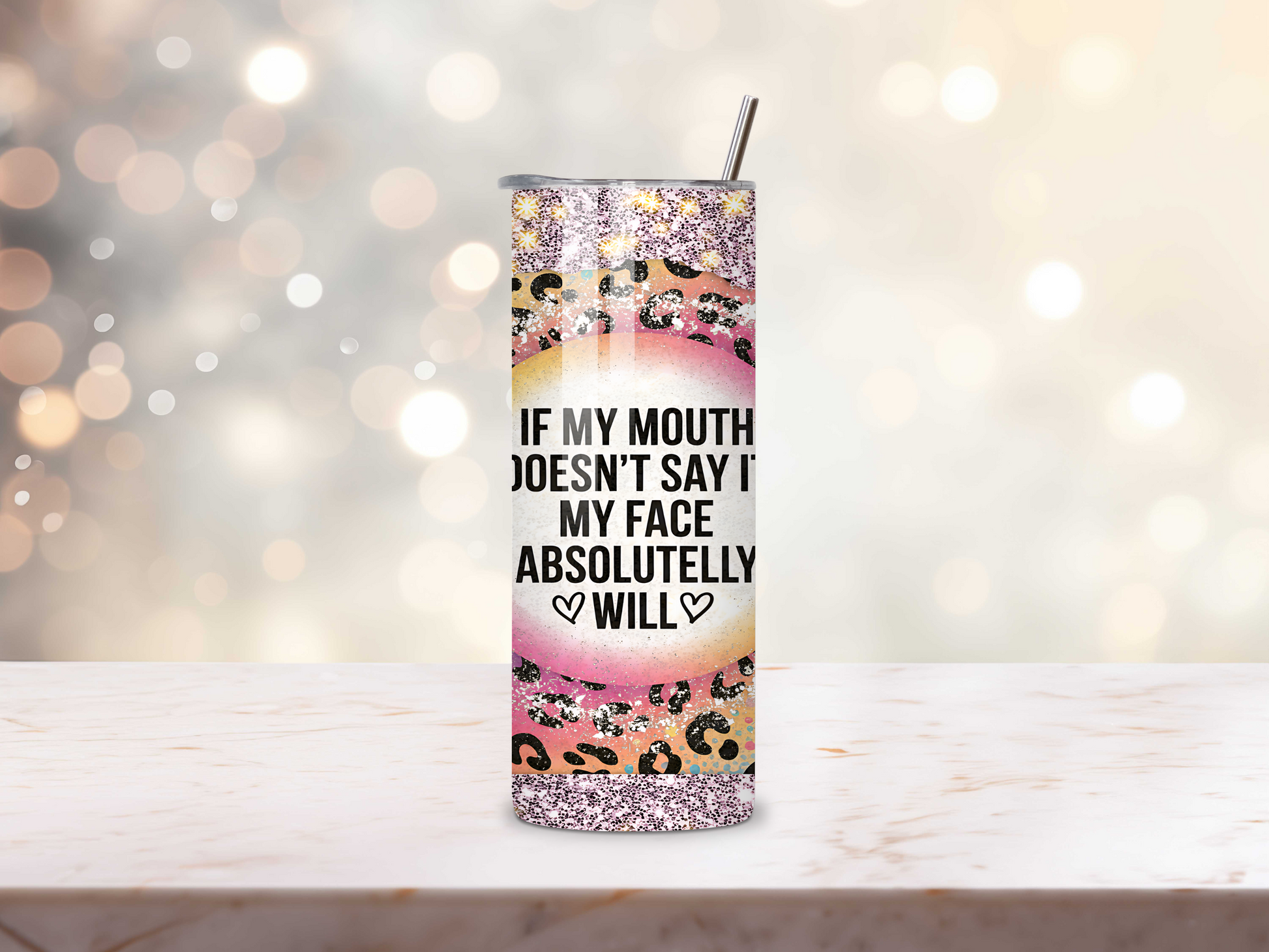 Close-up of glitter and cheetah print tumbler with funny quote.