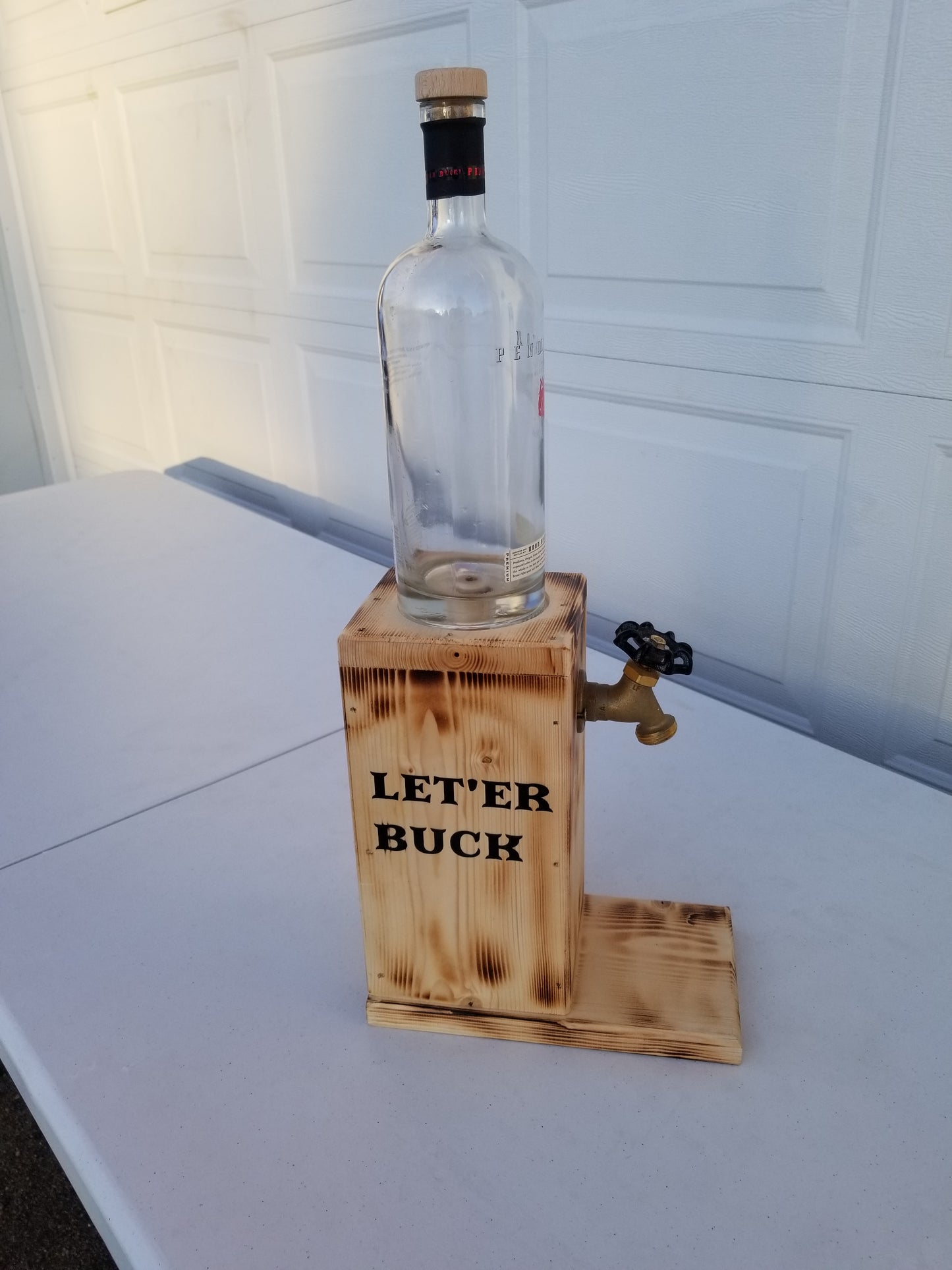 Pendleton dispenser measuring 22 inches tall, 10 inches deep, 6 inches wide.