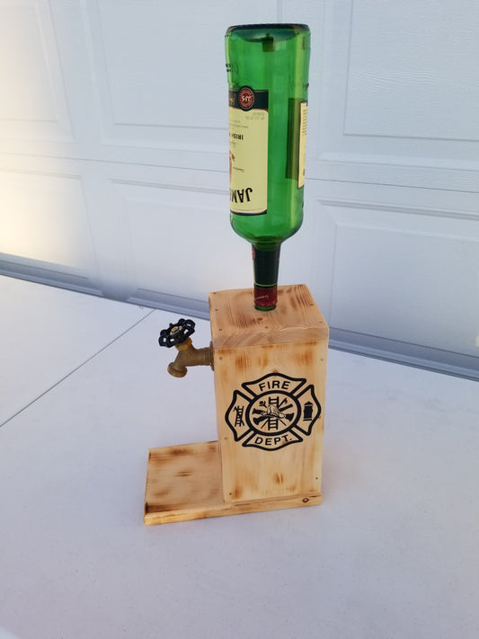 Jameson liquor dispenser with Maltese cross burned on both sides.