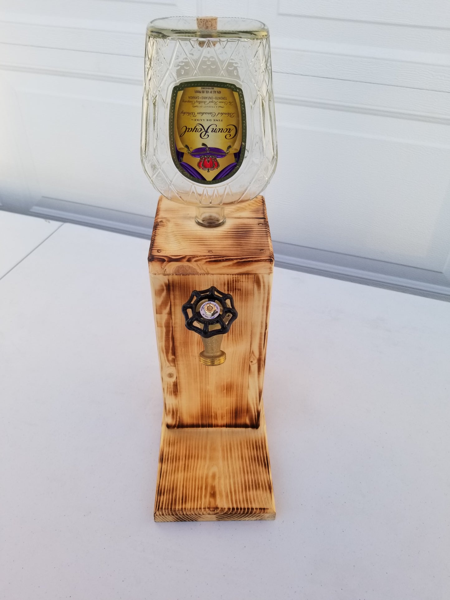Crown Royal dispenser measuring 19 inches tall, 10 inches deep, 6 inches wide.