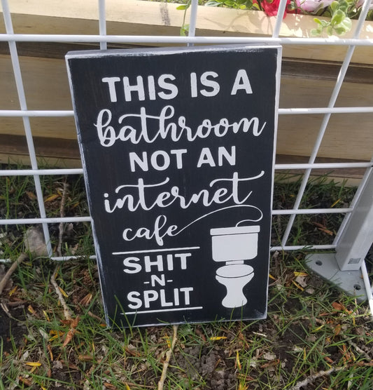 This is a bathroom not an internet cafe  Shit and split sign
