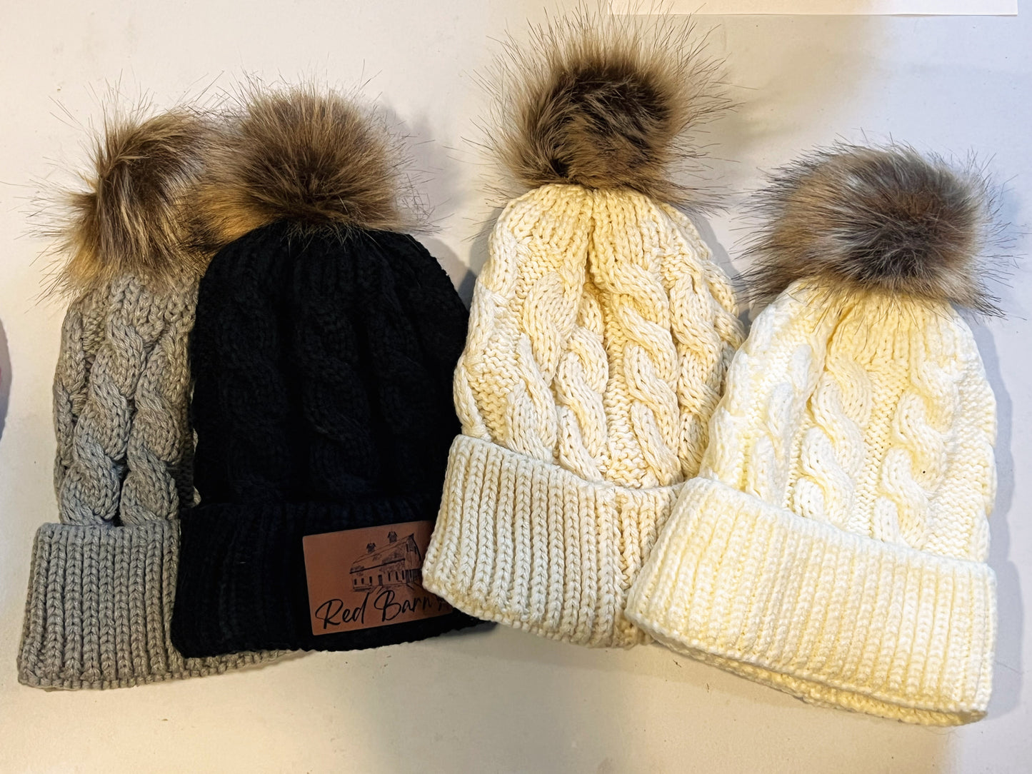 Stocking hats with engraved leather patches