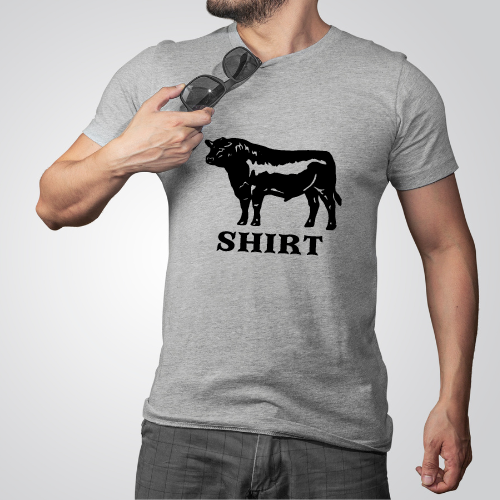 A man wearing a gray t-shirt with a bold black and white bull design in the center and the word 'SHIRT' below it.