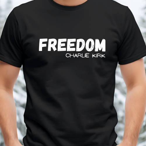 Black t-shirt with 'Freedom Charlie Kirk' printed on it against a neutral background