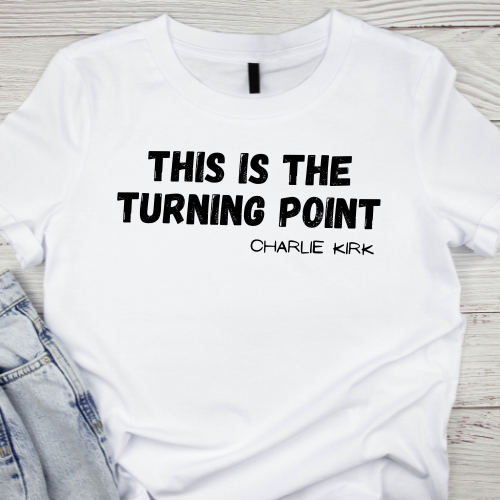 Close-up of printed phrase: This Is the Turning Point Charlie Kirk