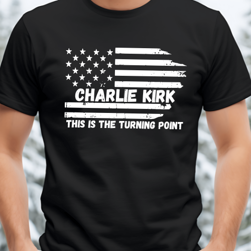 Close-up of distressed flag with Charlie Kirk in stripe and text This Is the Turning Point