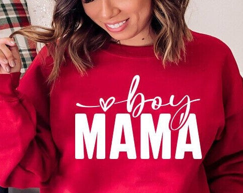 Crewneck sweatshirt with “boy MAMA” text in bold, colorful letters displayed on a neutral background.