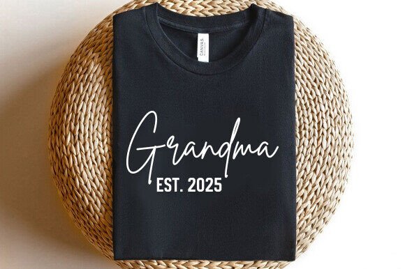 Cream-colored crewneck sweatshirt that says “Grandma Est.” with a customizable year in elegant lettering.