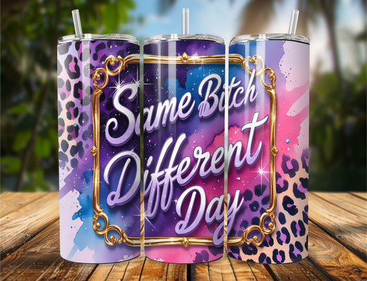 "Tumbler with 'Same Bitch Different Day' text in colorful purples, pinks, and blues with leopard print background. Available in 20oz or 30oz."