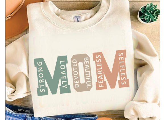 Crewneck sweatshirt featuring the word “MOM” with descriptive words like strong, lovely, and fearless designed inside the letters.