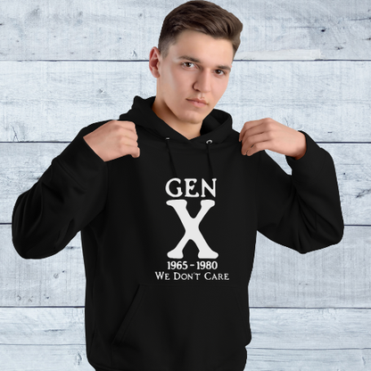 Person wearing a black hoodie with 'GEN X 1965-1980 WE DON'T CARE' text against a light wooden panel background