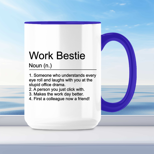 White coffee mug with the phrase "Work Bestie" and its playful definition in black text. Handle shown in dark blue.
