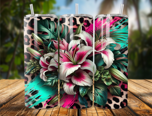 "Tumbler featuring white lilies and pink floral accents over a leopard print background. Available in 20oz or 30oz sizes."