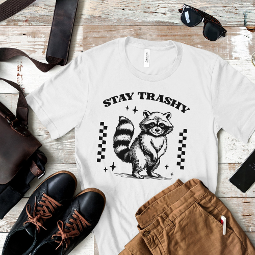 Funny raccoon t-shirt with "Stay Trashy" text – a cute & mischievous trash panda design