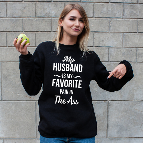Woman wearing “My Husband Is My Favorite Pain in the Ass” crewneck