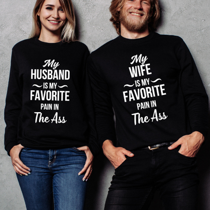 Couple wearing matching funny relationship shirts